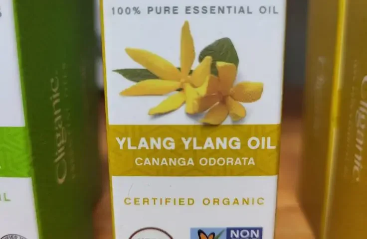 A display of Cliganic Essential Oils, including Ylang Ylang, available at The WOW Center in Missouri Valley.