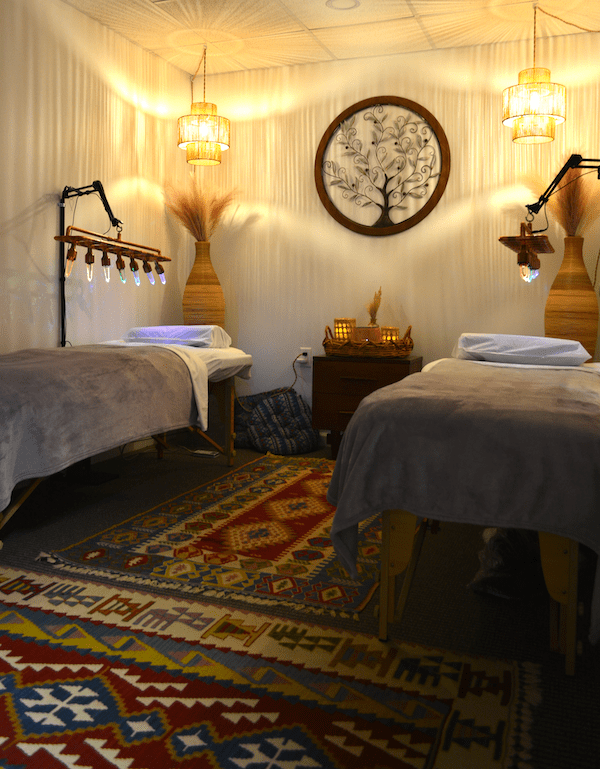 Quartz Crystal Chakra lights and Tourmaline Jade grounding mats in a private healing room.