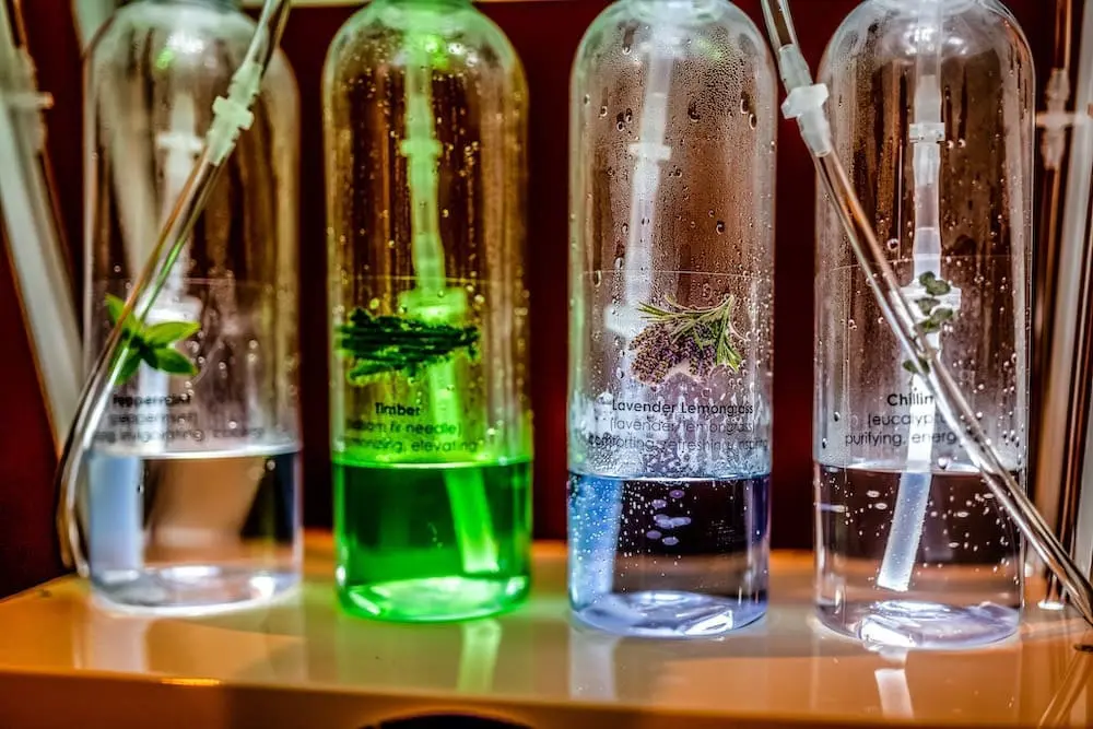 Four flavored oxygen aromatherapy bottles including Peppermint, Timber, Lavender Lemongrass, and Chillin Eucalyptus at The WOW Center.